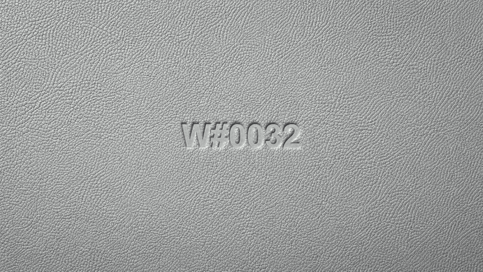 W#0032 embossed in pale vegetable-tanned leather